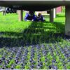 Black recycled rubber matting laid as a slip-resistant surface on a ramp