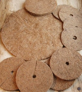 Coir mulch disc fitted around the base of a young tree