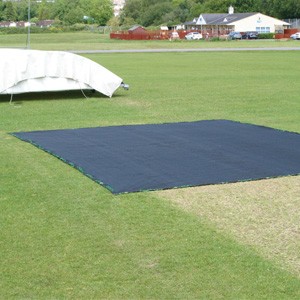 Roll of Tildenet grass germination sheet laid over newly seeded ground