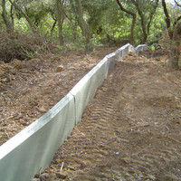 Herpetosure newt and slow worm fencing panels installed along a site boundary