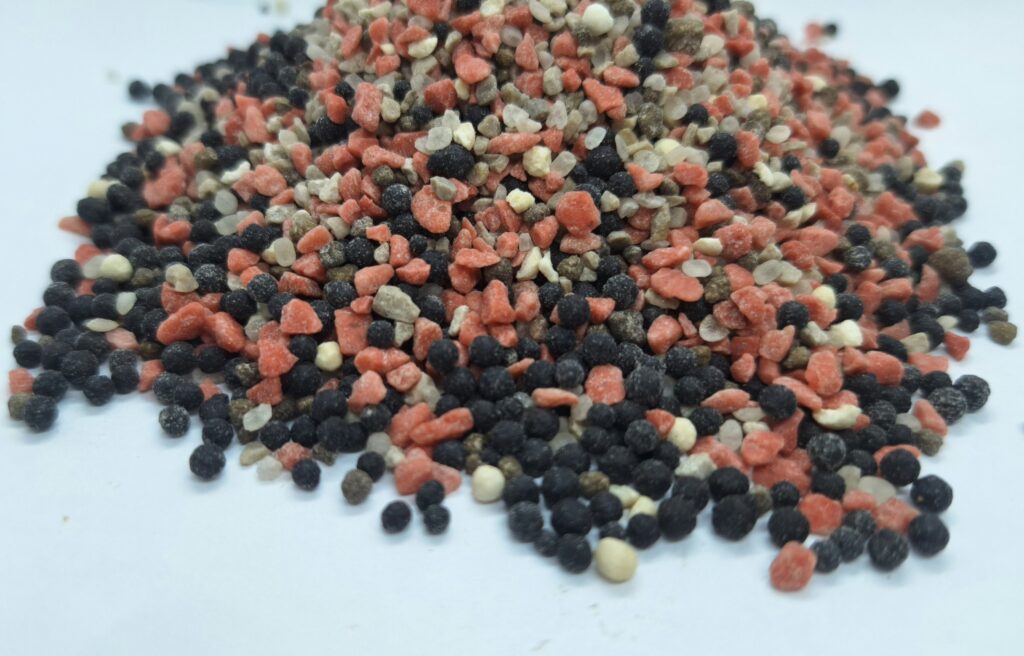 Close up of Phoenix Pro-Bacter 2-3mm granules with active Bacillus bacteria and Trichoderma fungi