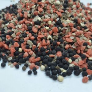 Close up of Phoenix Pro-Bacter 2-3mm granules with active Bacillus bacteria and Trichoderma fungi
